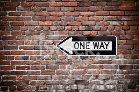 One Way Sign With Grunge Brick Wall Background Stock Photo Royalty