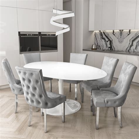 White Oval Dining Table With 6 Silver Buttoned Dining Chairs Furniture123