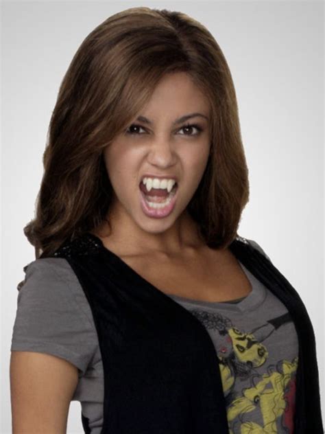 A Woman With Her Mouth Open And An Angry Look On Her Face Is Posing For