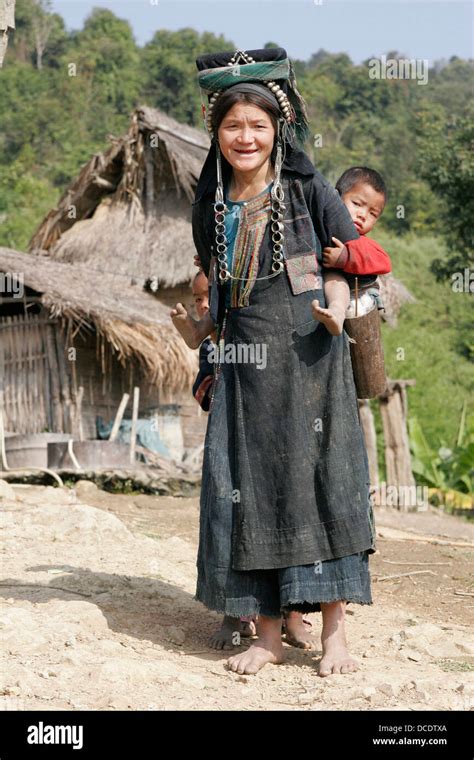 Ethnic Akha Woman In Tribal Village Near Phongsali Laos Stock Photo