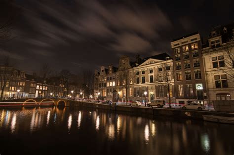 amsterdam bridge canal dark dutch lights netherlands night river tourism water 4k