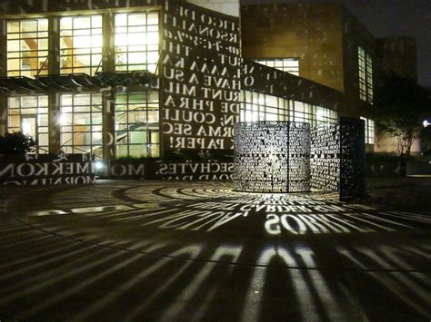 At Night The Md Anderson Library Is Illuminated By Jim Sanborns