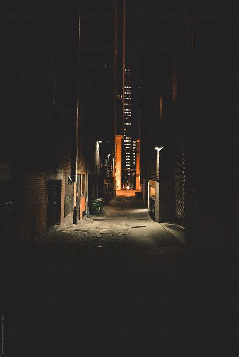 A Dark Alley At Night By Alison Winterroth Stocksy United