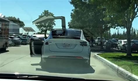 SPIED VIDEO Nabbed IN ACTION The Tesla Model X S Falcon Doors Get