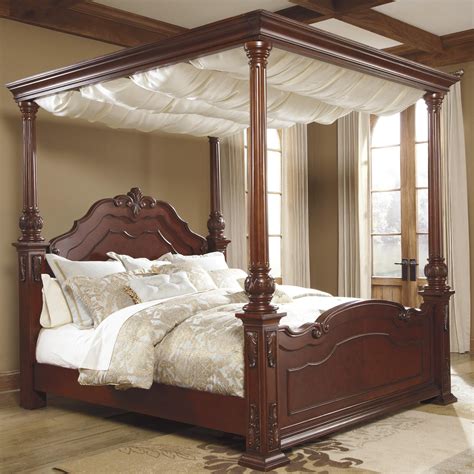 Martanny King Canopy Bed By Ashleybenchcraft Canopy Bedroom Sets