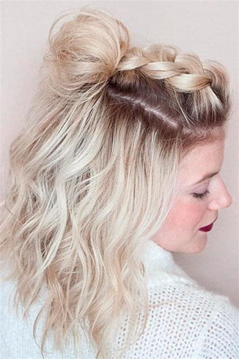 The hair around the crown is teased for an extra body, and the bottom hair is loosely twisted into a soft round bun, while the bangs are slightly curled to bring a playful element into the finished look. 19+ Prom Hairstyles Medium Hair