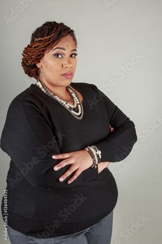 Mature Plus Size African American Woman With Natural Locks Posing In