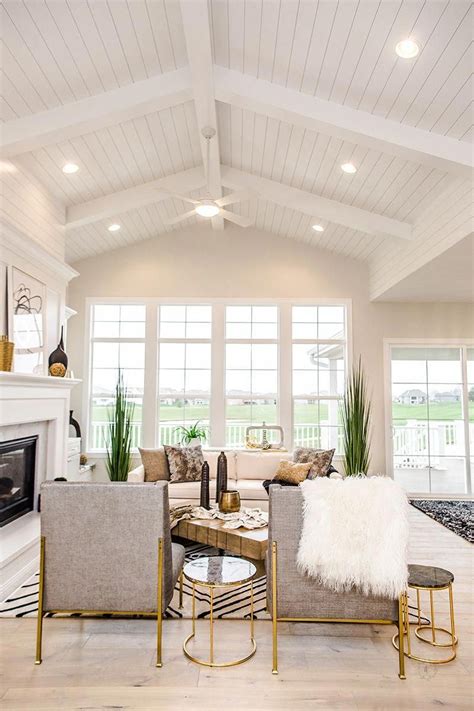 The ceiling, although often neglected, can be a wonderful element of architecture if you decide to highlight it. White shiplap ceiling #interiordecorationdetails | Vaulted ceiling living room, Beams living ...