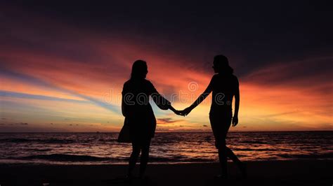 Silhouette Two Girls Holding Hands Together Beach Stock Photos Free