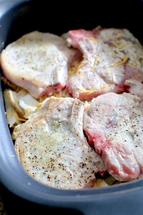 Place the two pork chops over top of the cheese sauce. Crock Pot Smothered Pork Chops and Potatoes - The Country Cook