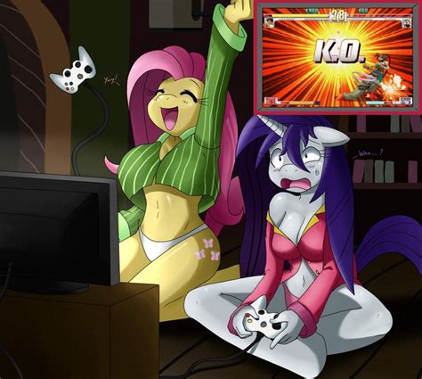 Fluttershy Keeps Beating Rarity At Video Games Mlp