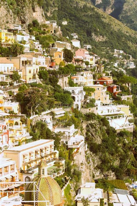 Colorful Home Built Into The Cliffs Of The Amalfi Coast In Positano