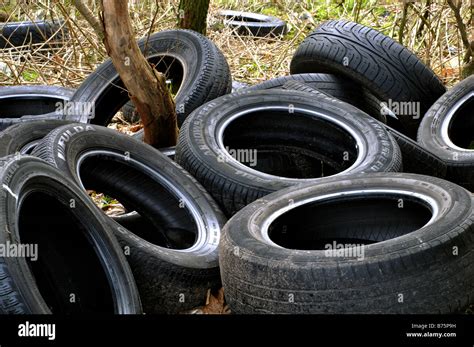 Old Tyres Fly Tipped By A45 Road Birmingham Uk Stock Photo Alamy