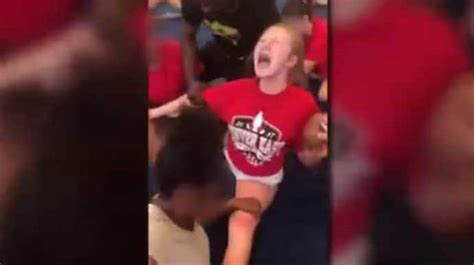 Disturbing Video Shows High School Cheerleaders Screaming While Being Forced To Do Splits Us