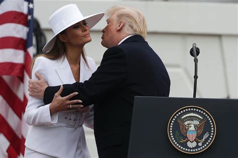 what melania and trump s hand holding struggles say about their marriage according to body