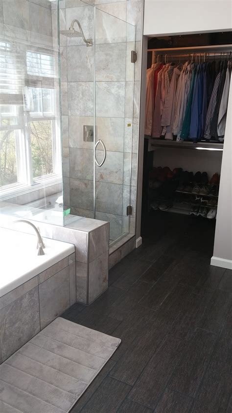 Penny tiles are coming back in style even stronger than ever. Gray master bathroom - ceramic tile from Menards ...