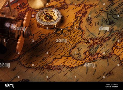 Old Compass Discovery And Wooden Plane On Vintage Paper Antique World