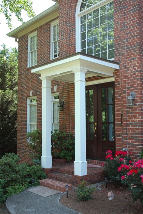 Other than losing a little footage don't know how of it being installed, the simple roof project turned out exactly as designed. Flat roof portico designed and built by Georgia Front ...
