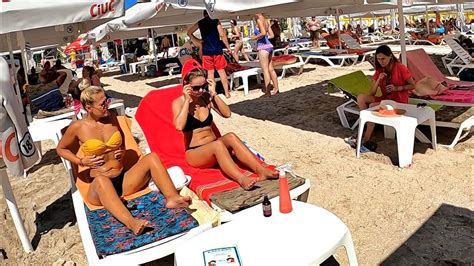 Constanta Romania Happy Summer Vacation In Mamaia Walking Along The Wonderful Sunny Beach