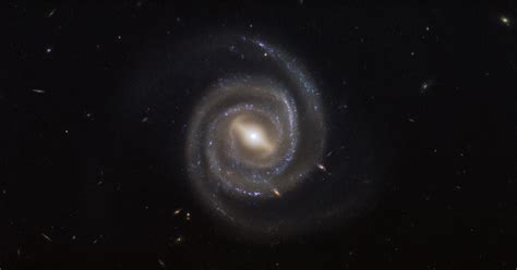 Two Examples Of Barred Spiral Galaxies That Are Said To Resemble The