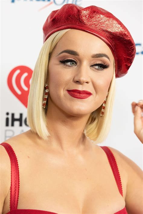busty singer katy perry showcasing her cleavage in a red dress the fappening