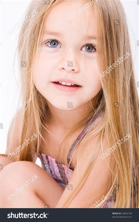 Beautiful Little Girl With Long Blonde Hair Stock Photo