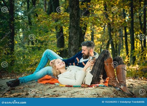 romantic picnic forest couple in love tourists relaxing on picnic blanket romantic date in