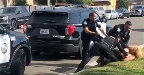 California Officer Captured On Video Punching Handcuffed Woman