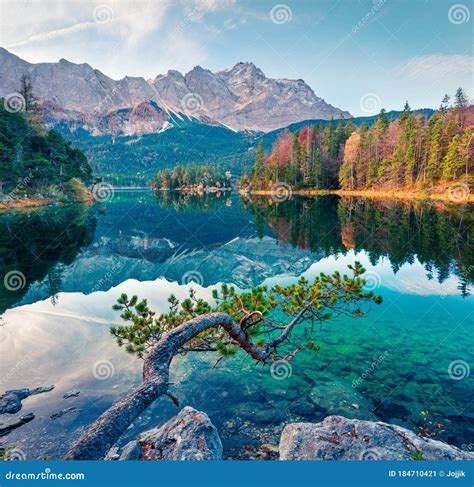 Splendid Morning Scene Of Eibsee Lake With Zugspitze Mountain Range On