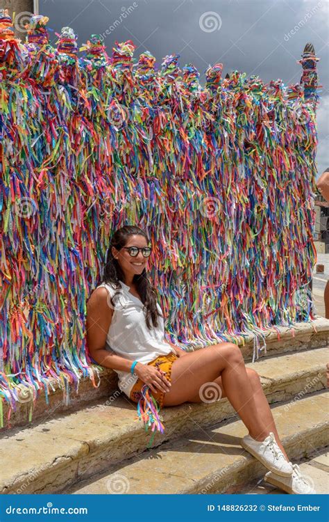 Woman Posing In Front Of Wish Ribbons At Bonfim Church In Salvador