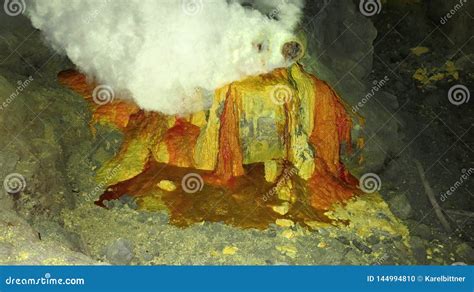 Raw Sulfur Mining In The Crater Of Kawah Ijen Active Volcano On Java