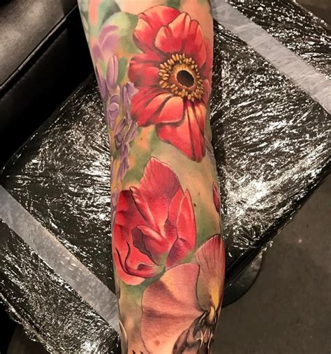 Color Flowers Tattoo By Damon Conklin Tattoonow