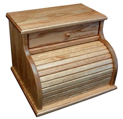 The style and design of this wood bread box will add a pleasing focal point to your kitchen counter top. Solid Wood Bread Box with Drawer from DutchCrafters Amish ...