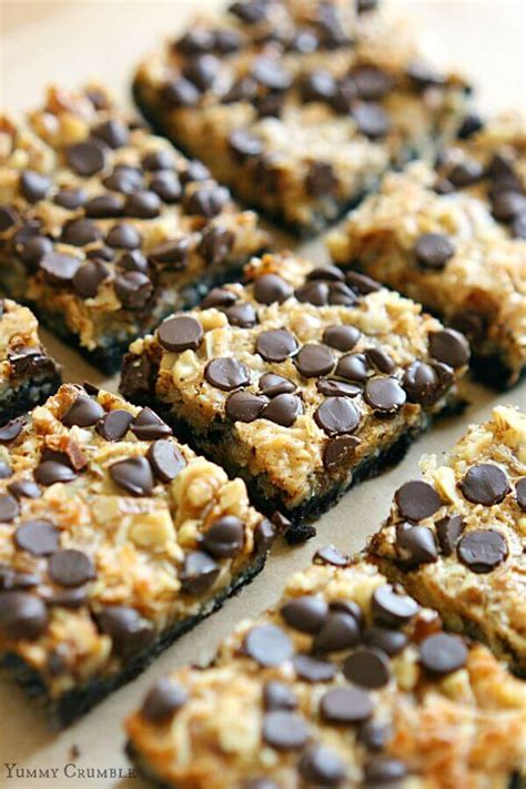Hello dolly bars, coconut dream bars, seven layer bars, magic cookie bars, coconut magic squares… over the years, these bars have been one of the most a soft graham cracker crust topped with layers of coconut and chocolate makes the bars truly as magical as their title suggests. Pumpkin Spice Oreo Magic Cookie Bars {Easy Layered Dessert ...