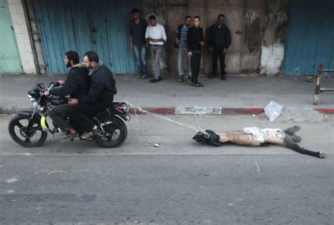 Horrifying Video Palestinians Drag Body Through Street Houraney Com