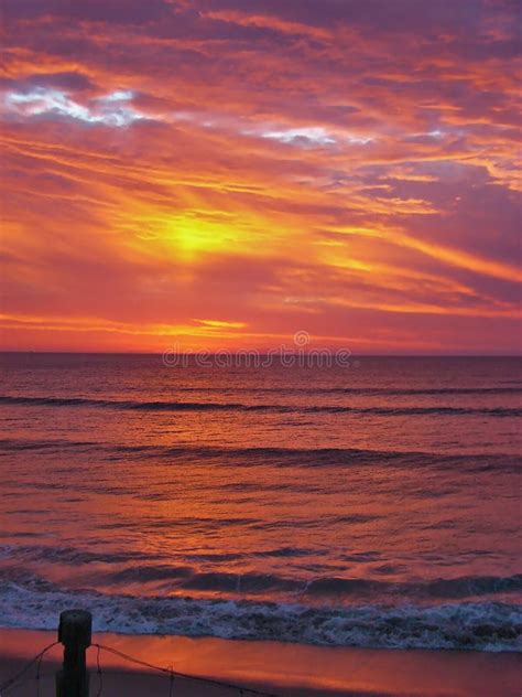 Red Sunset Over Ocean Stock Photo Image Of Dramatic 145925916