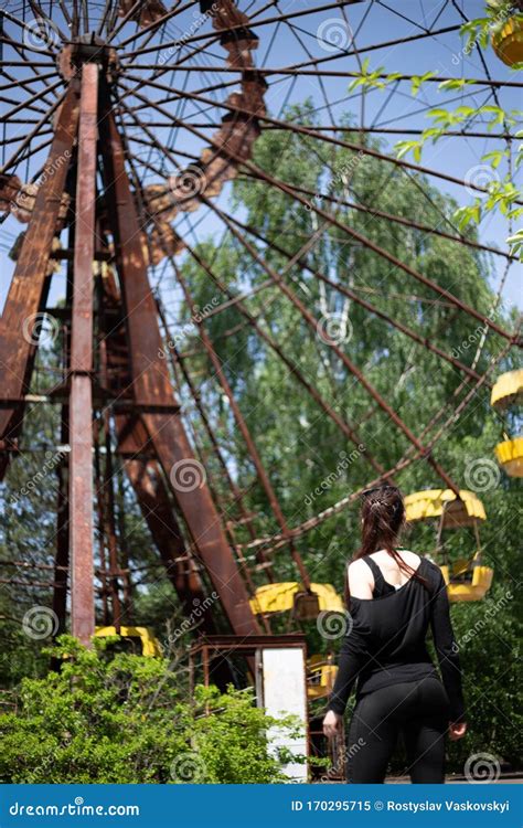 Girl Looking On The Ferris Wheel In Pripyat Amusement Park Editorial