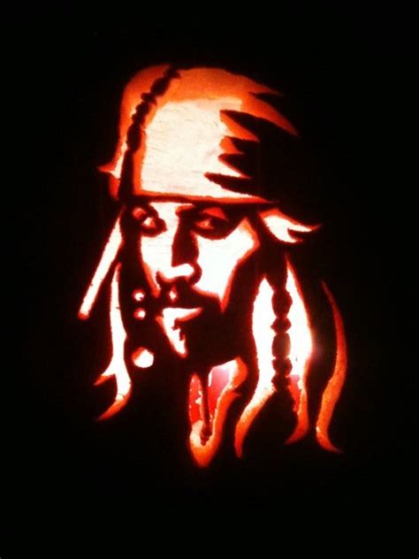 A Pumpkin Carved To Look Like Captain Jack Sparrow