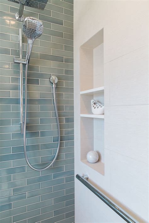 Timeless Shimmering Crystal Blue Heath Tiles Face An Accent Wall In