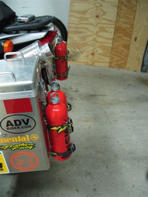 The msr fuel bottles work specifically with msr stoves. MSR Bottle Racks Mounted to Panniers (pics and stuff)