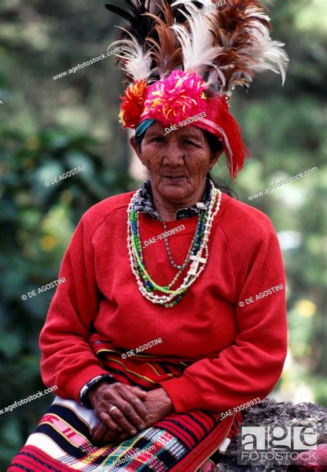 Igorot Woman Wearing Traditional Clothing And Feather Headdress Baguio