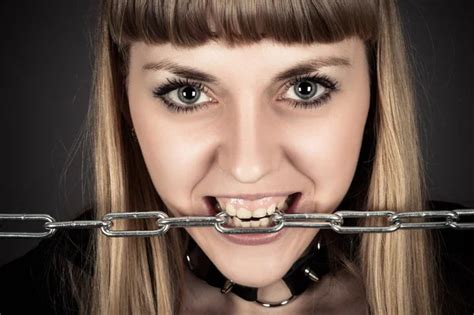Brutal Woman With A Chain In Teeth Stock Image Everypixel