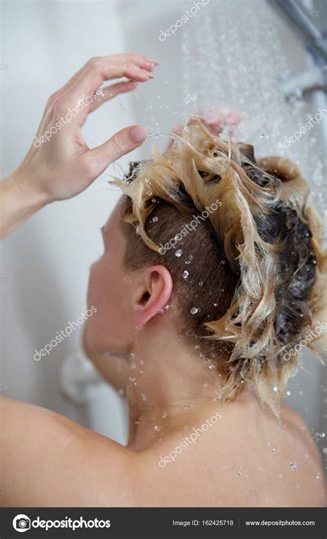 Beautiful Naked Woman Washing Her Hair While Taking Shower Stock