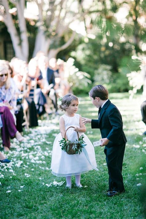 Flower Girl And Page Boy Are Active Atmosphere For The Bride And Groom