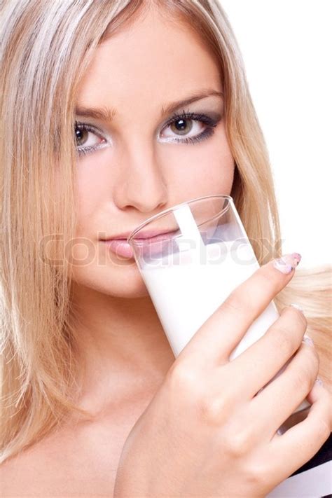 Beautiful Woman Drinking Milk On A Stock Image Colourbox