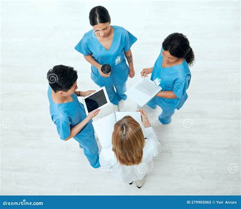 Teamwork Tablet Or Above Of Doctors In Meeting Planning A Surgery