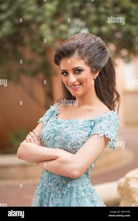 Beautiful Young Woman Arms Folded Smiling Outdoors Stock Photo Alamy
