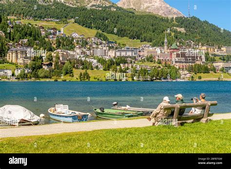 Tourists Enjoy The Sun At Lake Stmoritz In Spring Upper Engadine