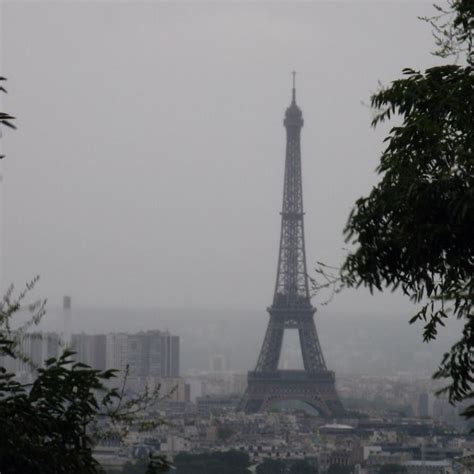 The Eiffel Tower In The Rain From Montmarte Eiffel Tower Eiffel Tower