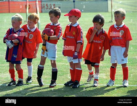 Children Dressed In Manchester United Football Shirts Stock Photo Alamy